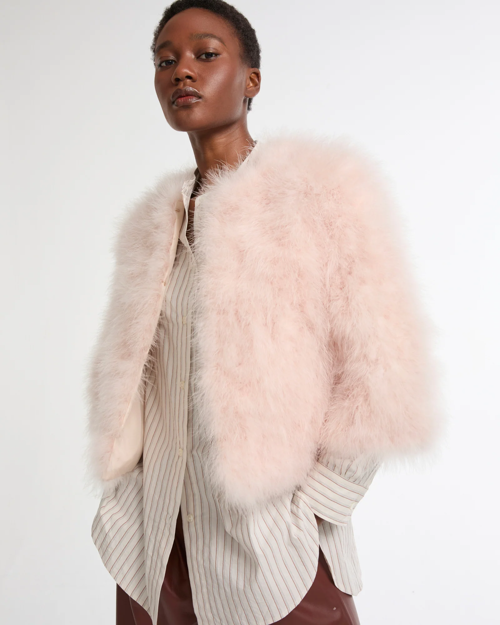 Veste courte en plumes